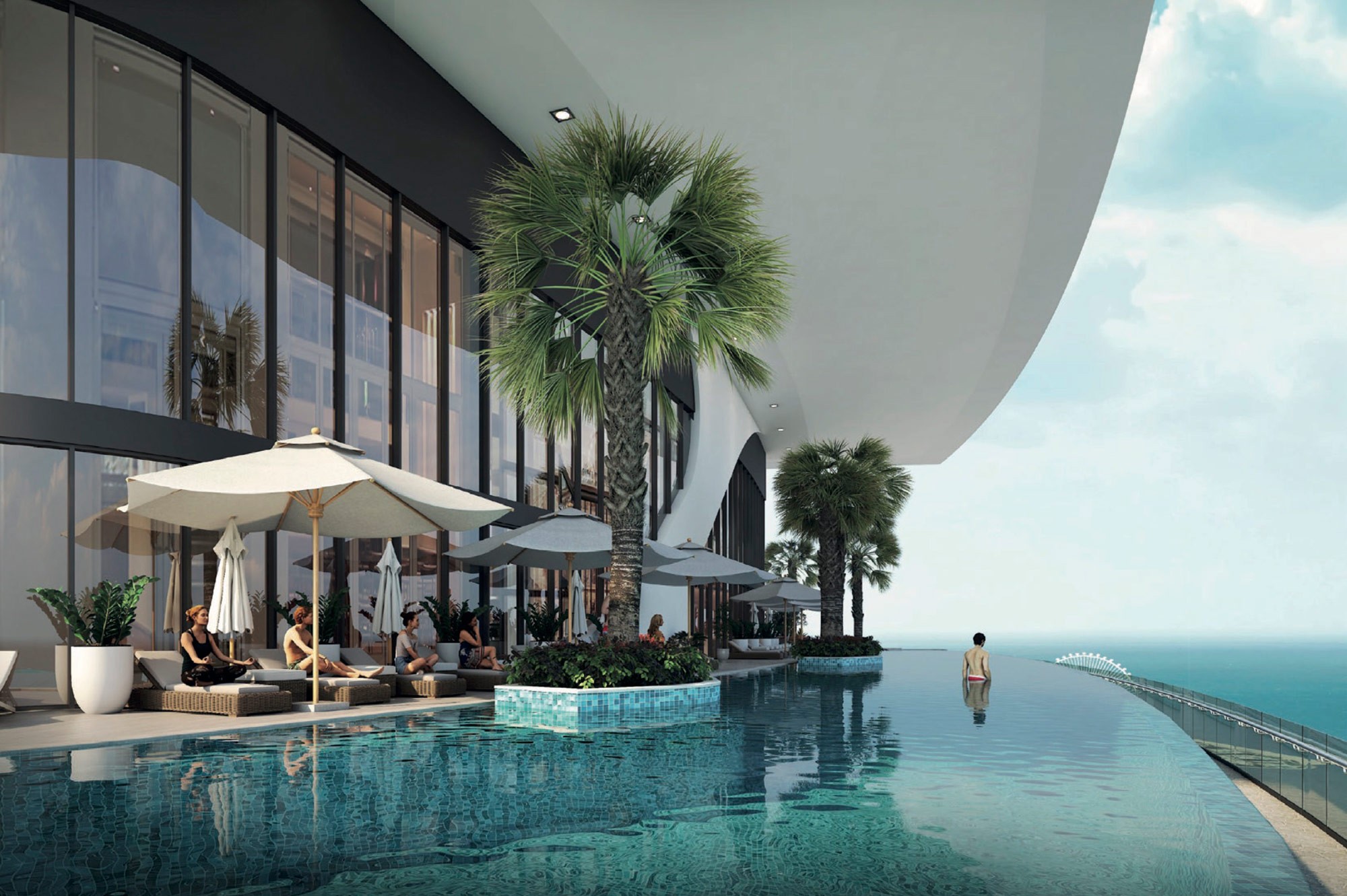 Luxury infinity pool at Sobha Seahaven with palm trees and ocean views for premium real estate.