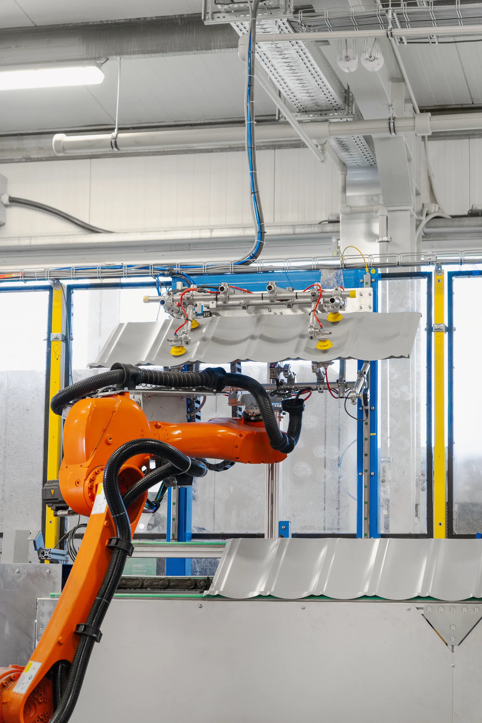 Robotic suction-based hanging station