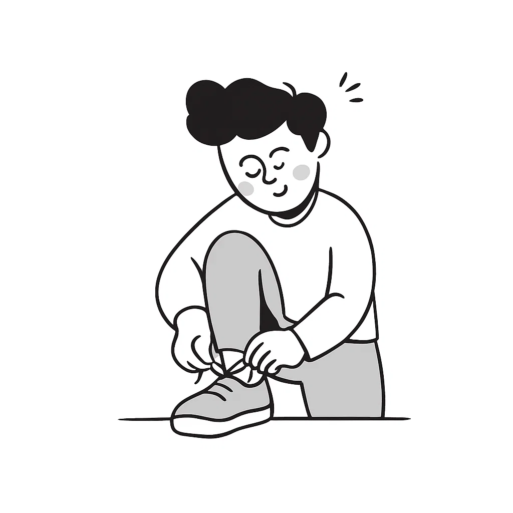 clear drinking glass with coffee on top of white table