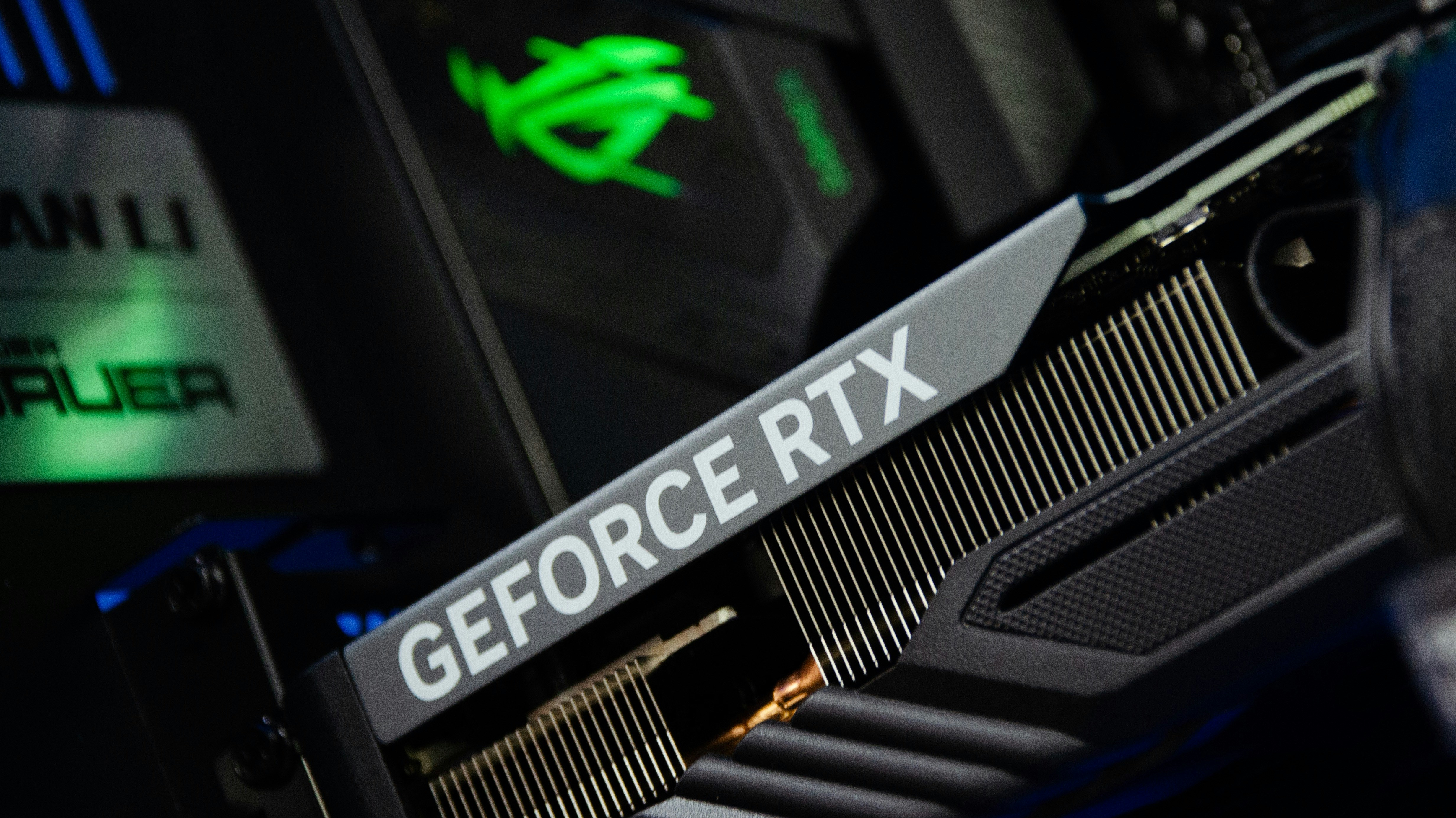 Close-up photo of a GeForce RTX graphics card installed inside a desktop PC.