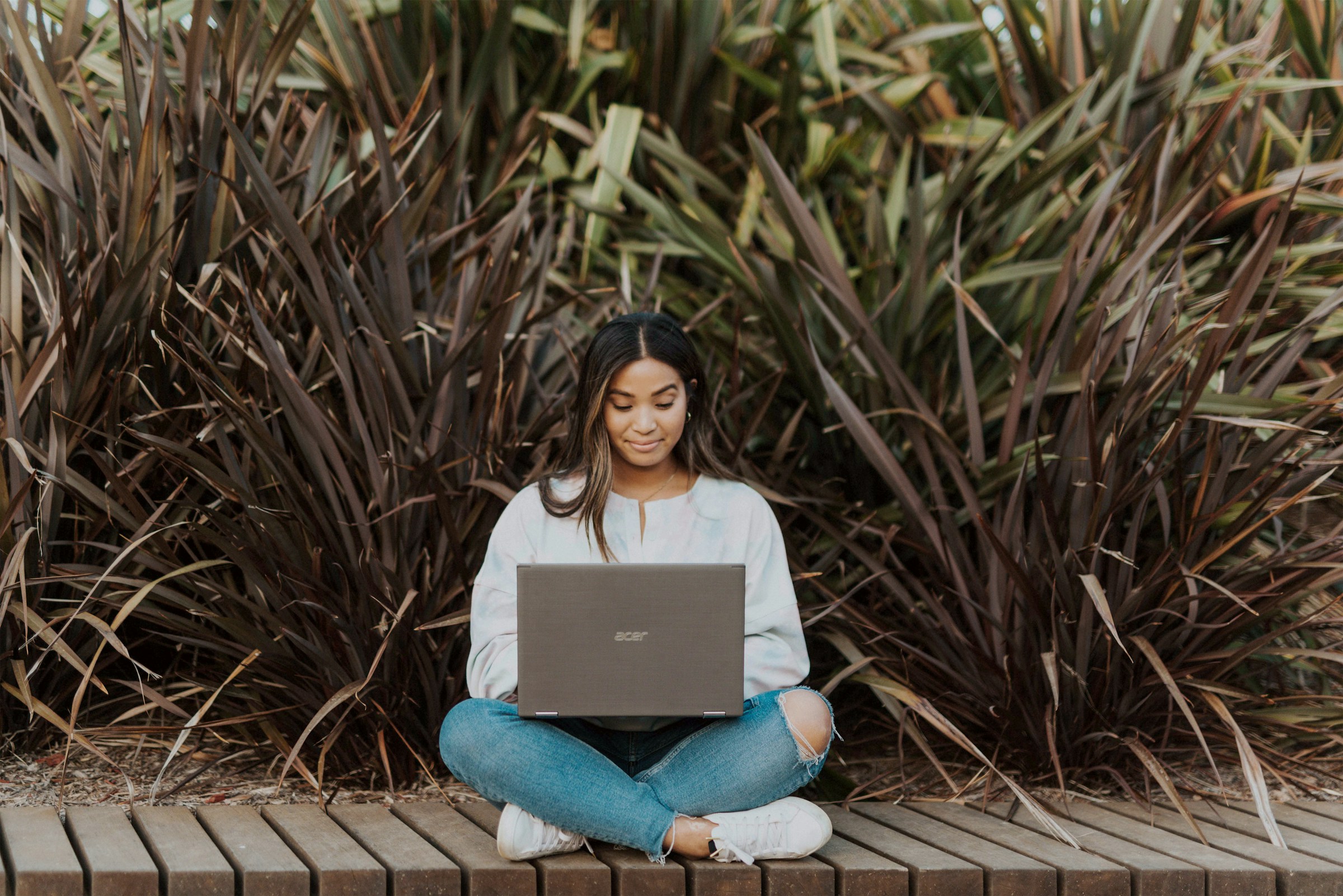 woman on laptop - AI Rewriting Tool