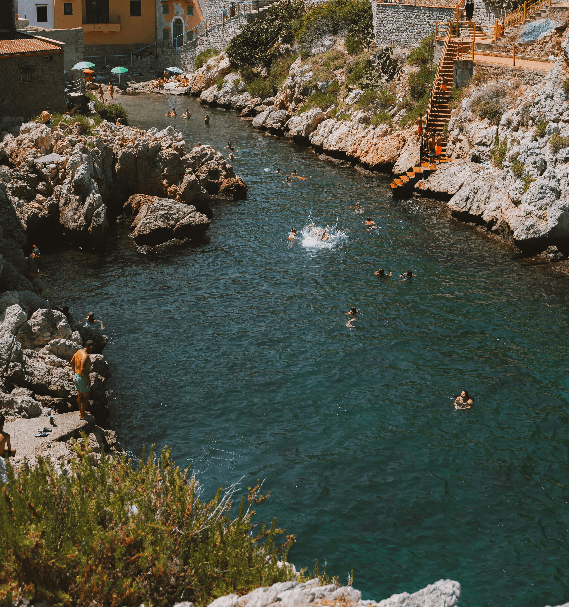 kids lying on a glass land and smiling