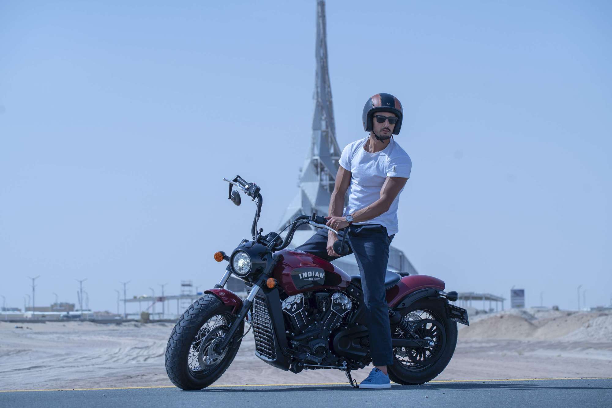 Male model on a motorbike showcasing Baume & Mercier watch: Baume & Mercier Campaign Photoshoot | Relity Group