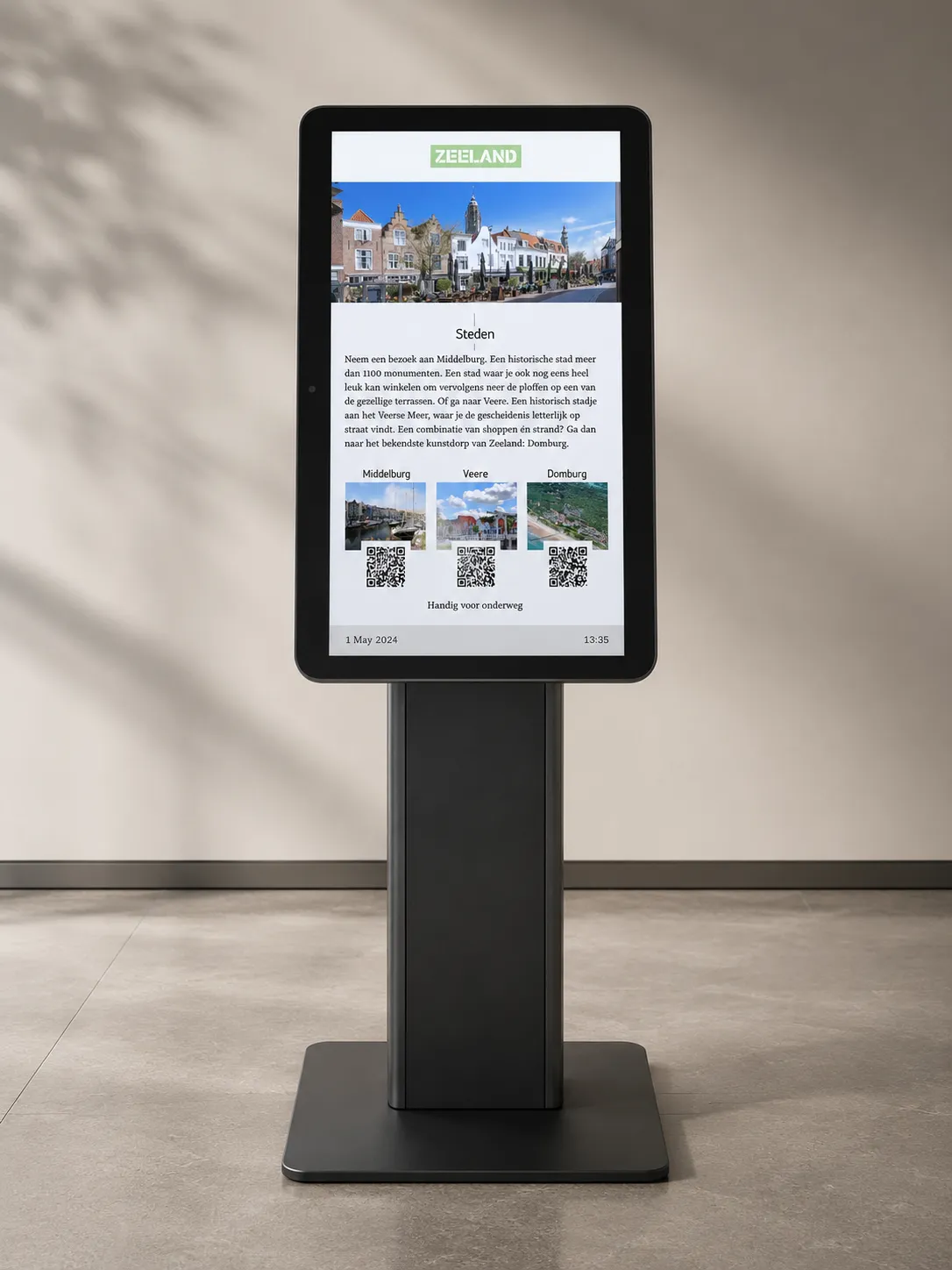 AOpen cTILE 22 Gen3 running ChromeOS with Bizplay kiosk mode, displaying interactive visitor information about Zeeland.