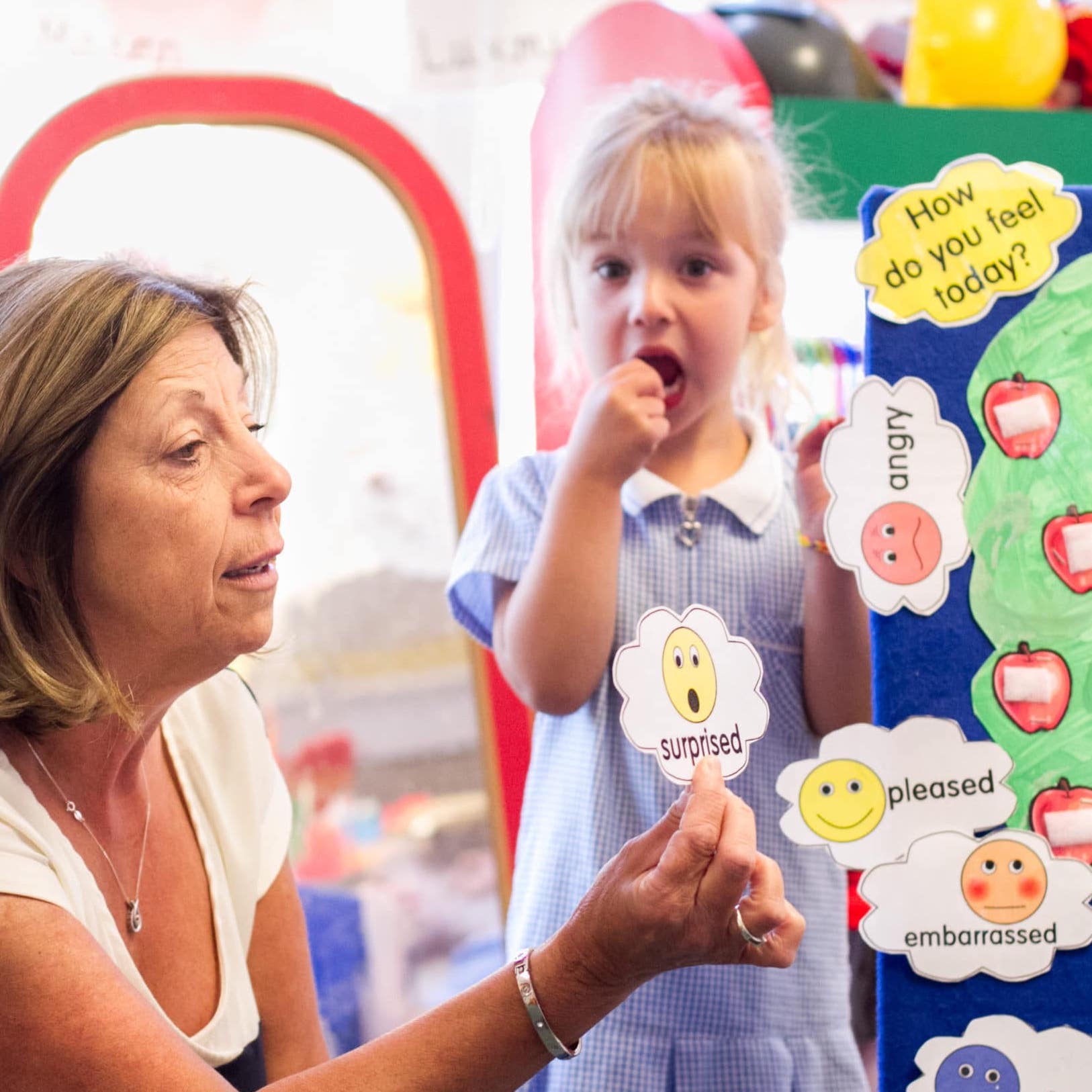 NurtureUK team working with a young girl