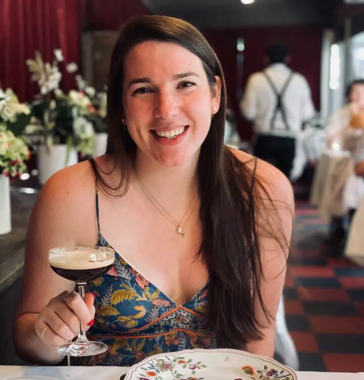 Picture: Profile picture of woman holding an espresso martini.