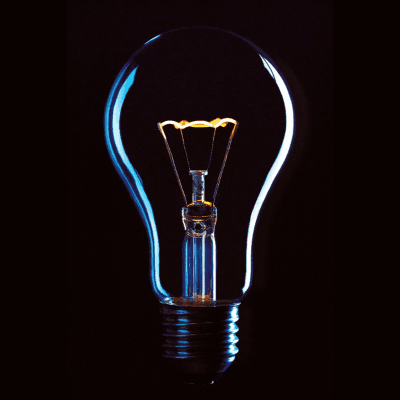 A lightbulb with a dark background