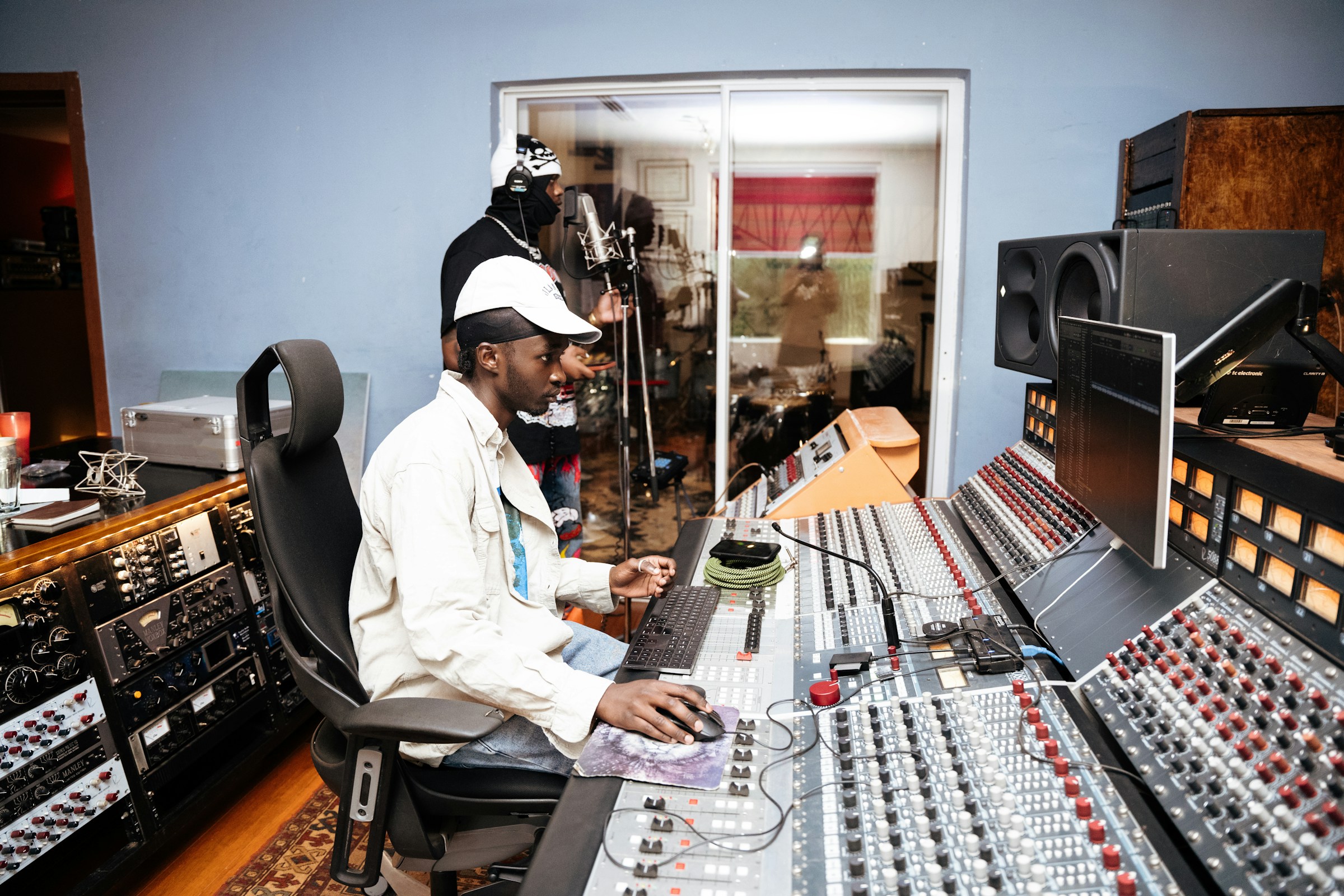 person making music - Music Producer vs. Composer