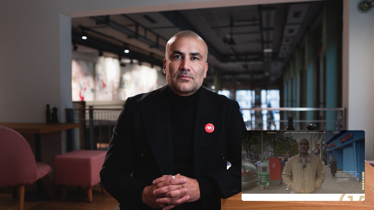 Bright orange drawstring fabric bag tied at the top, printed with a bold black smiley face and the text “Smiley Co” above it against an orange background.