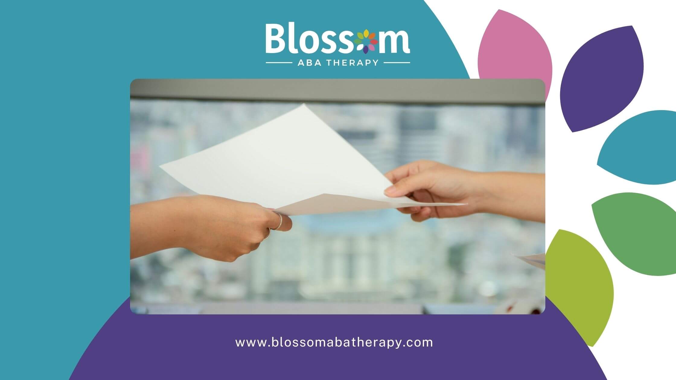 Two ABA therapist hands exchange a paper across a desk in a high-rise office with city view in background