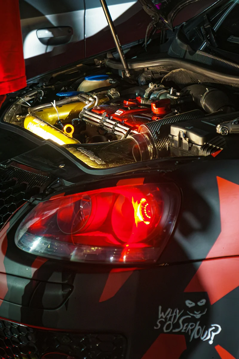 HyperAuto Care Engine Bay Detailing service process in a professional auto care workshop