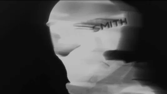 Side view of a skier wearing a Smith ski helmet