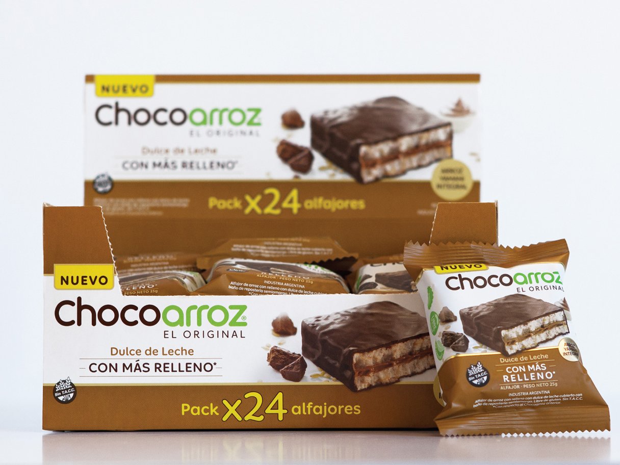 Rooftops of a coastal town with the sea in background