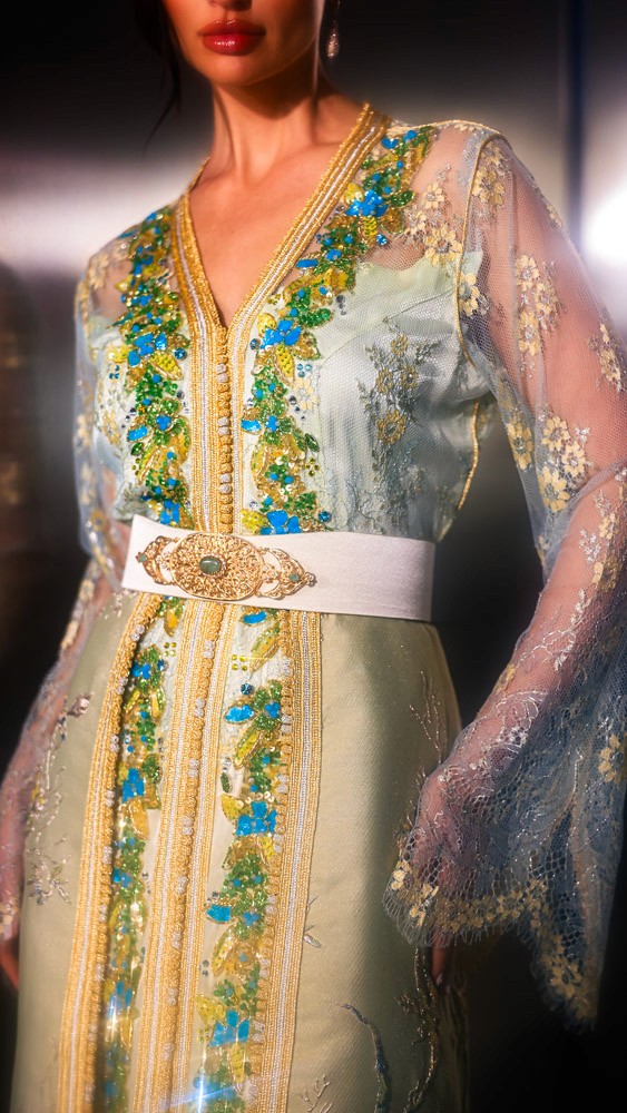 Beige and gold Moroccan caftan with blue embroidery, handcrafted couture piece designed for luxury occasions in Bahrain