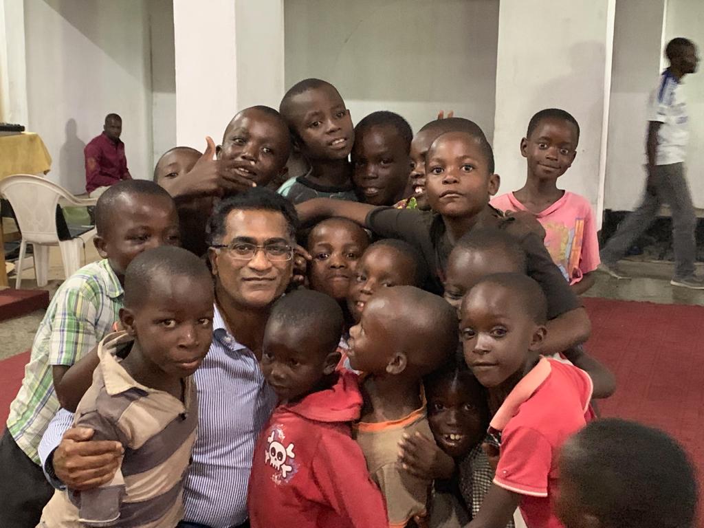 a couple of people that are sitting at a table