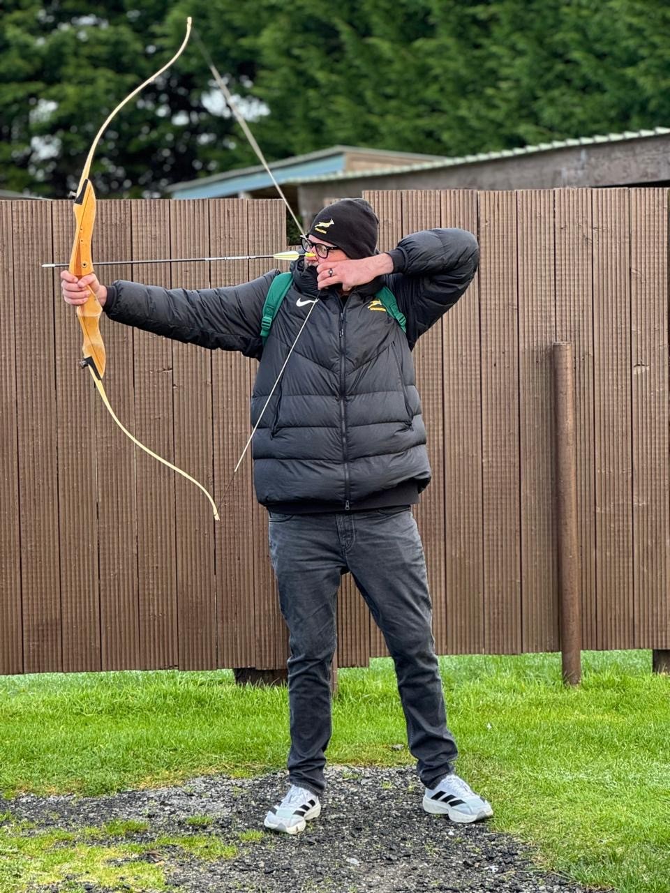 Image of eben etzebeth on stage at an eventra group event