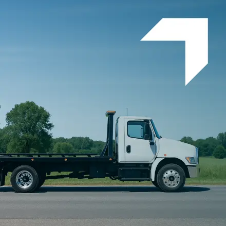 White tow truck representing Tow Truck Insurance services by GIA Group, LLC