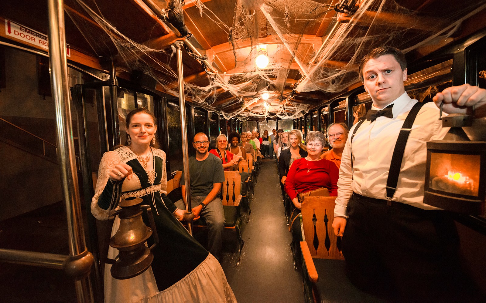 Tour group on Boston Ghosts & Gravestones trolley with guides in period costumes.