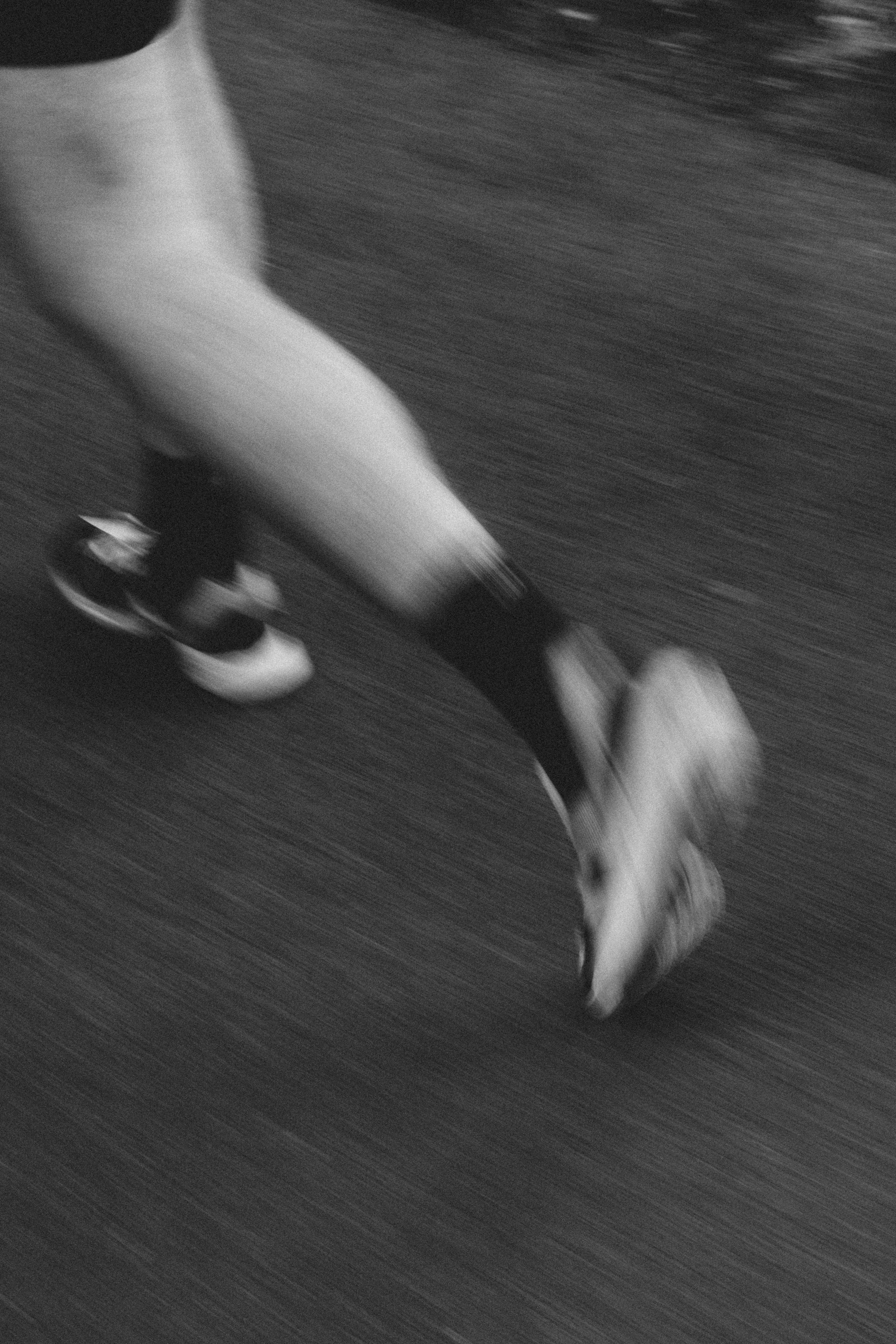 Feet running on a road