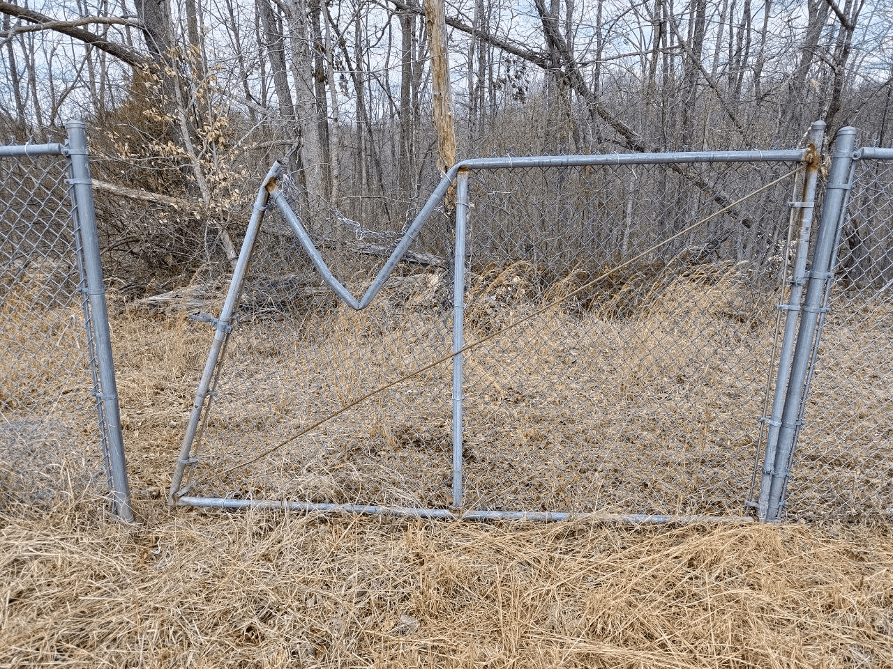 Chain Link Fence Repair: Replace a Bent Fence Post