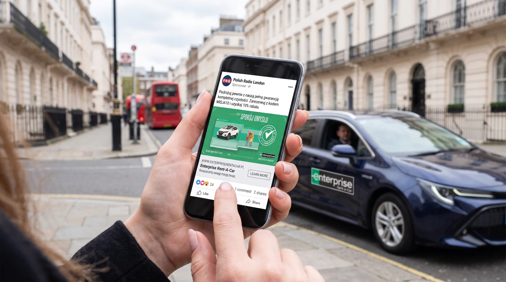 Woman viewing Enterprise Rent-A-Car Poland sponsored ad on Polish Radio London Facebook on smartphone in London with Enterprise car