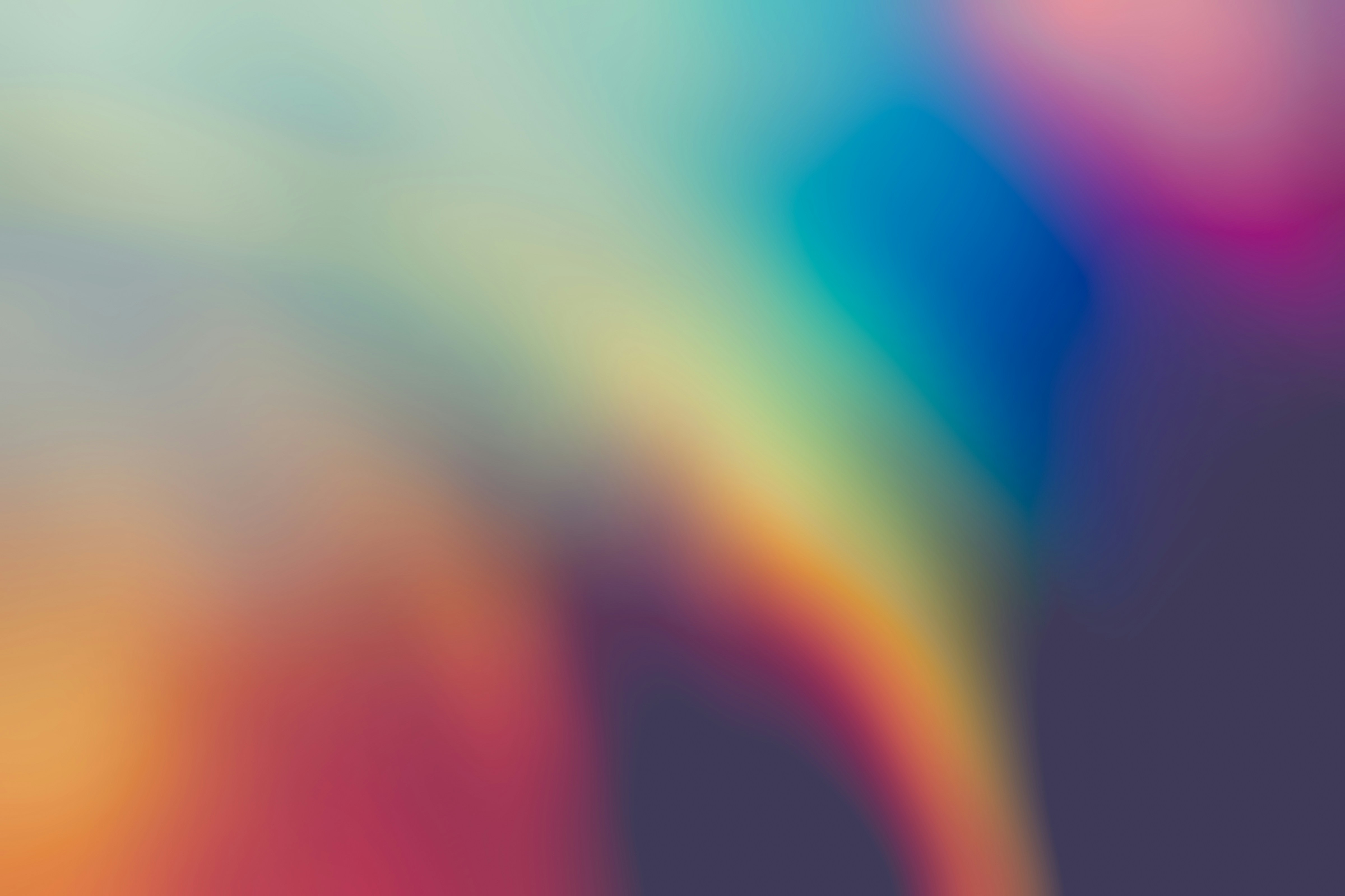 a blurry image of a rainbow