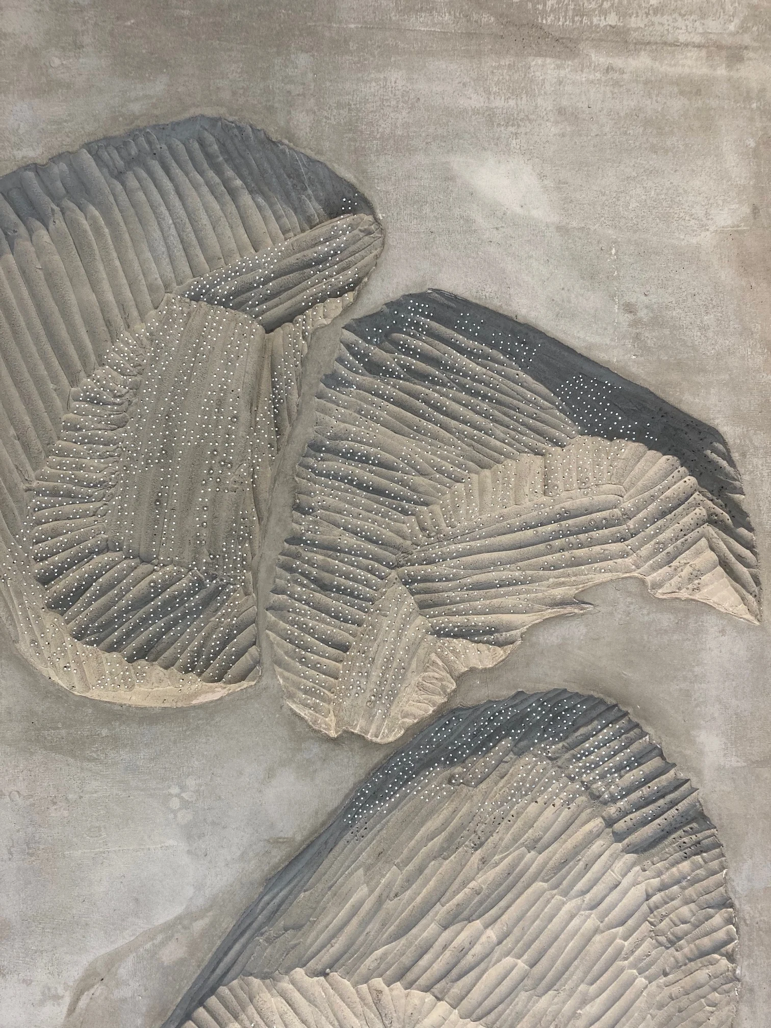 Installation photograph of the public commission work installed at Enghave Brygge Metro, Copenhagen. Concrete reliefs with optic fibers.