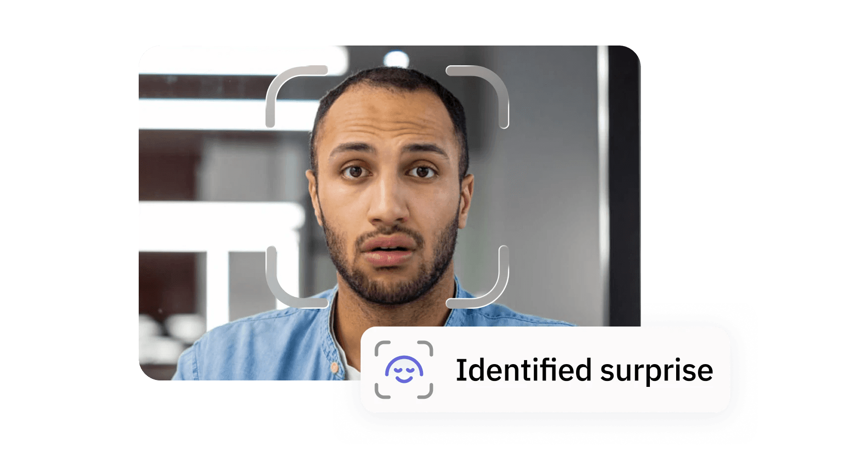 Close-up of a man’s face with AI overlay detecting and labeling a surprised expression