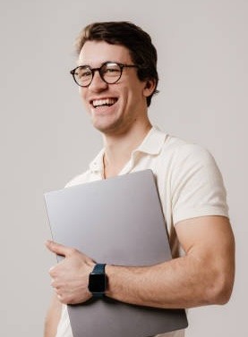 person writing on white paper