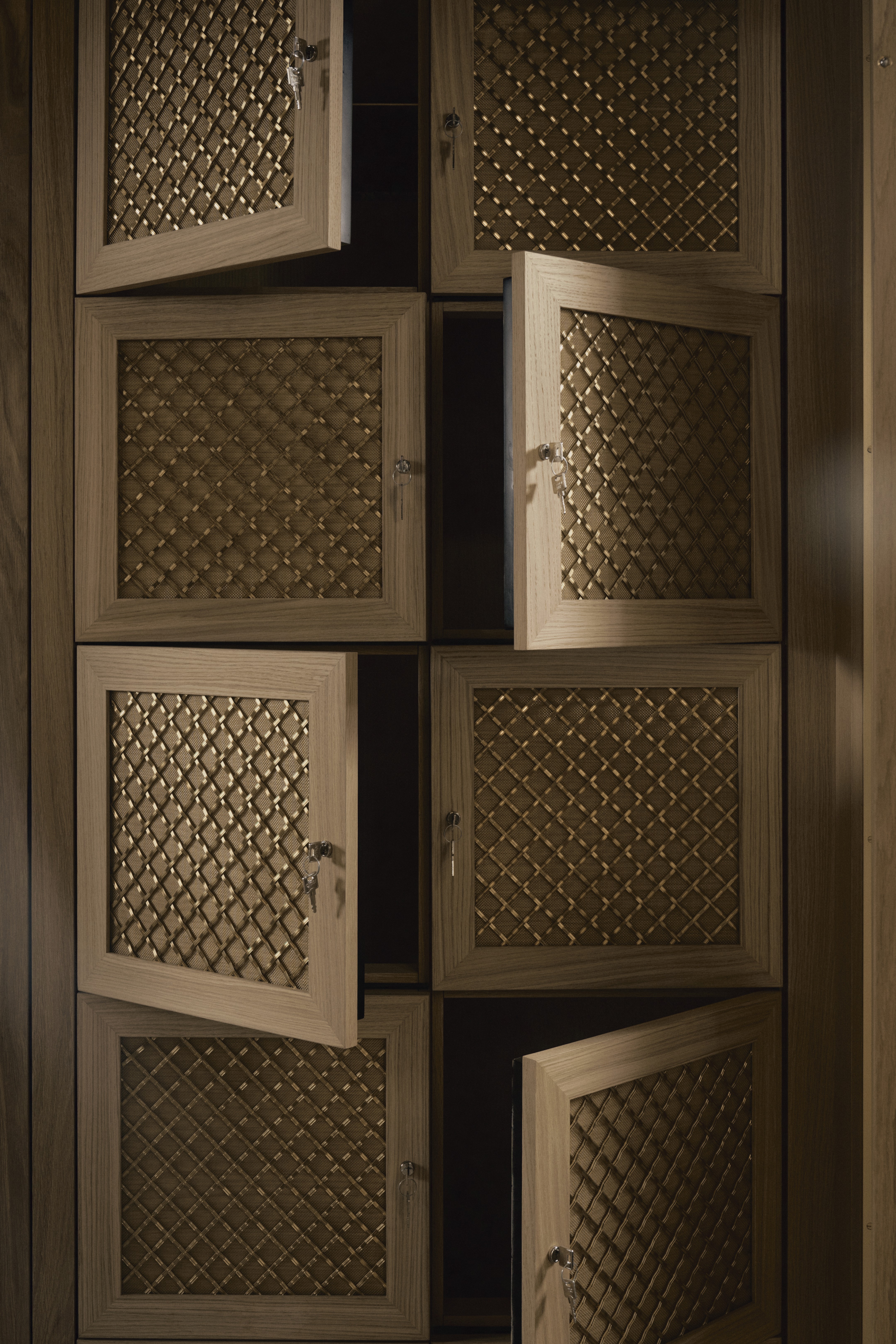 three people having a toast using three clear crystal wine glasses