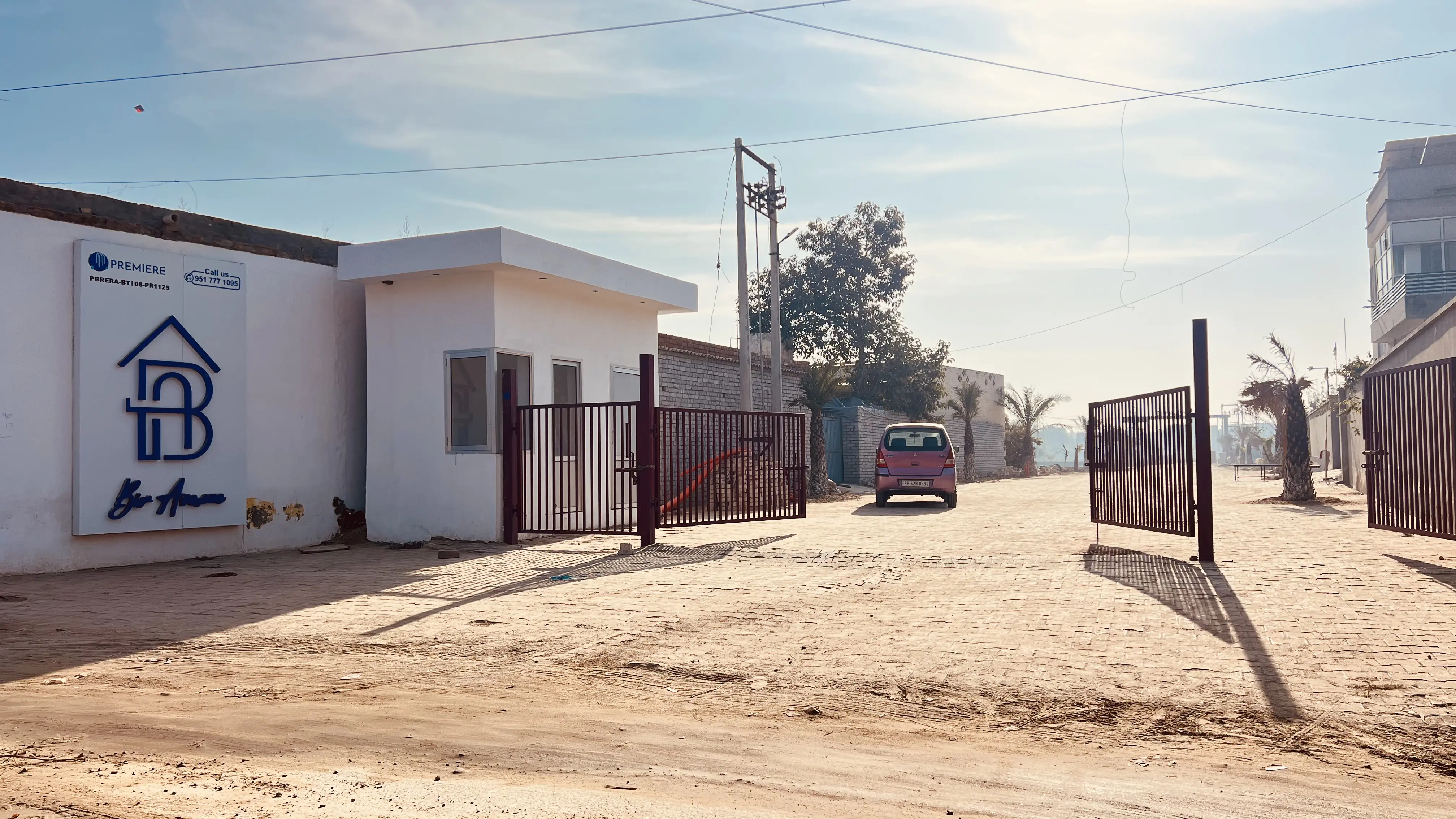 straight alley road with brown buildings