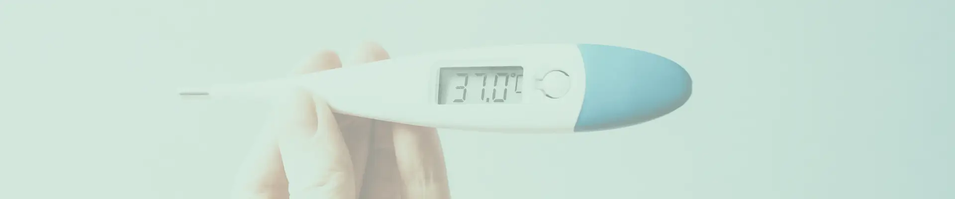 Close-up of a digital thermometer held in hand, displaying a temperature reading of 37.0°C, indicating normal body temperature.