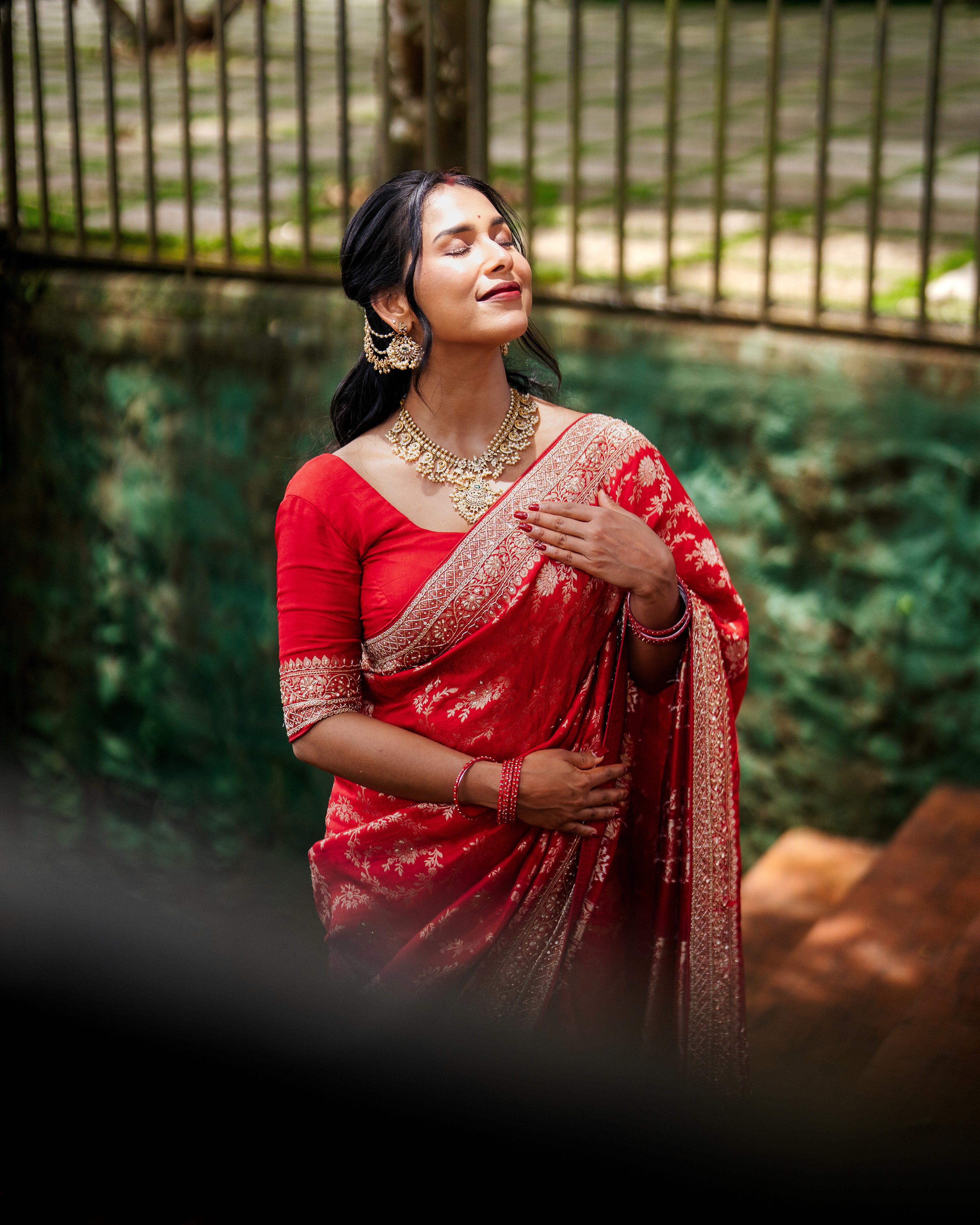 Warm string lights glow against a twilight sky.