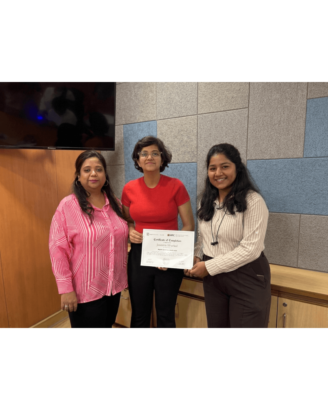 Rancho Labs student holding certificate of completion with family