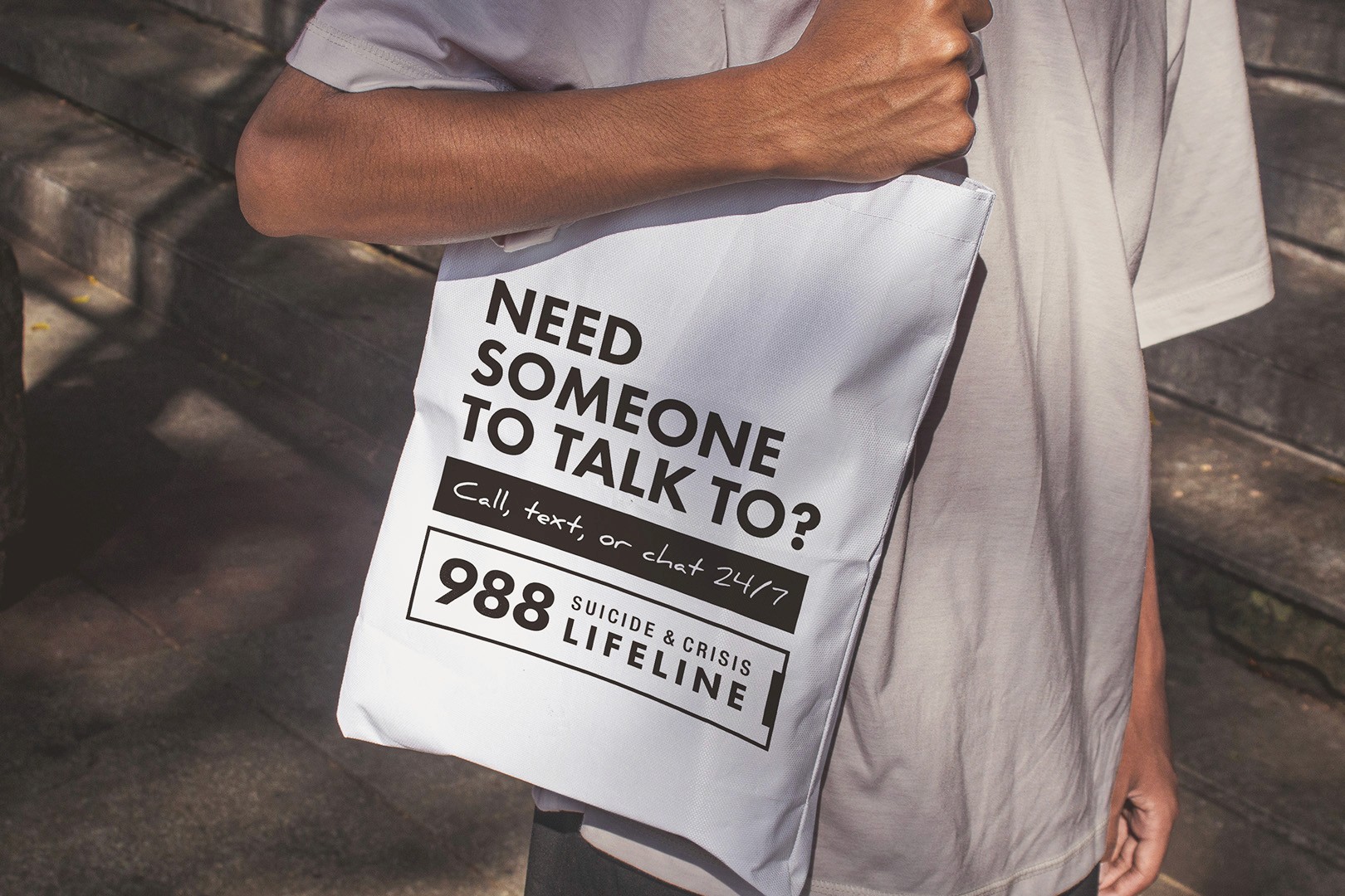 a cell phone leaning on a ledge