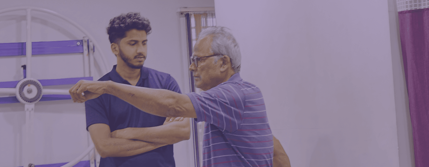 a man and a woman holding a green stick