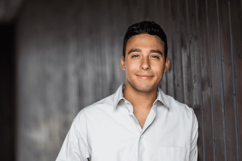 woman smiling wearing denim jacket