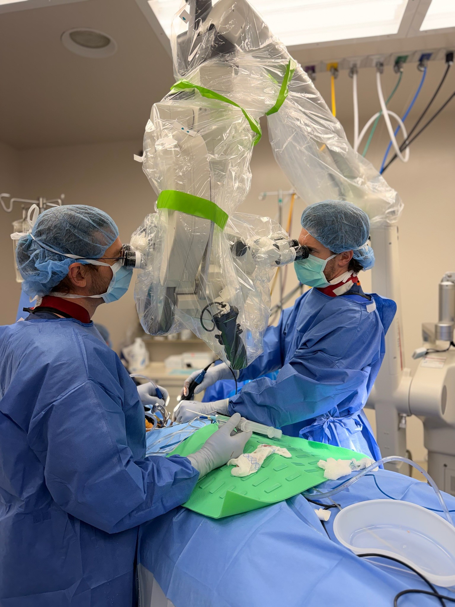 OSMC orthopedic surgeons performing a microsurgical procedure using surgical microscope at the St. Joseph Missouri practice