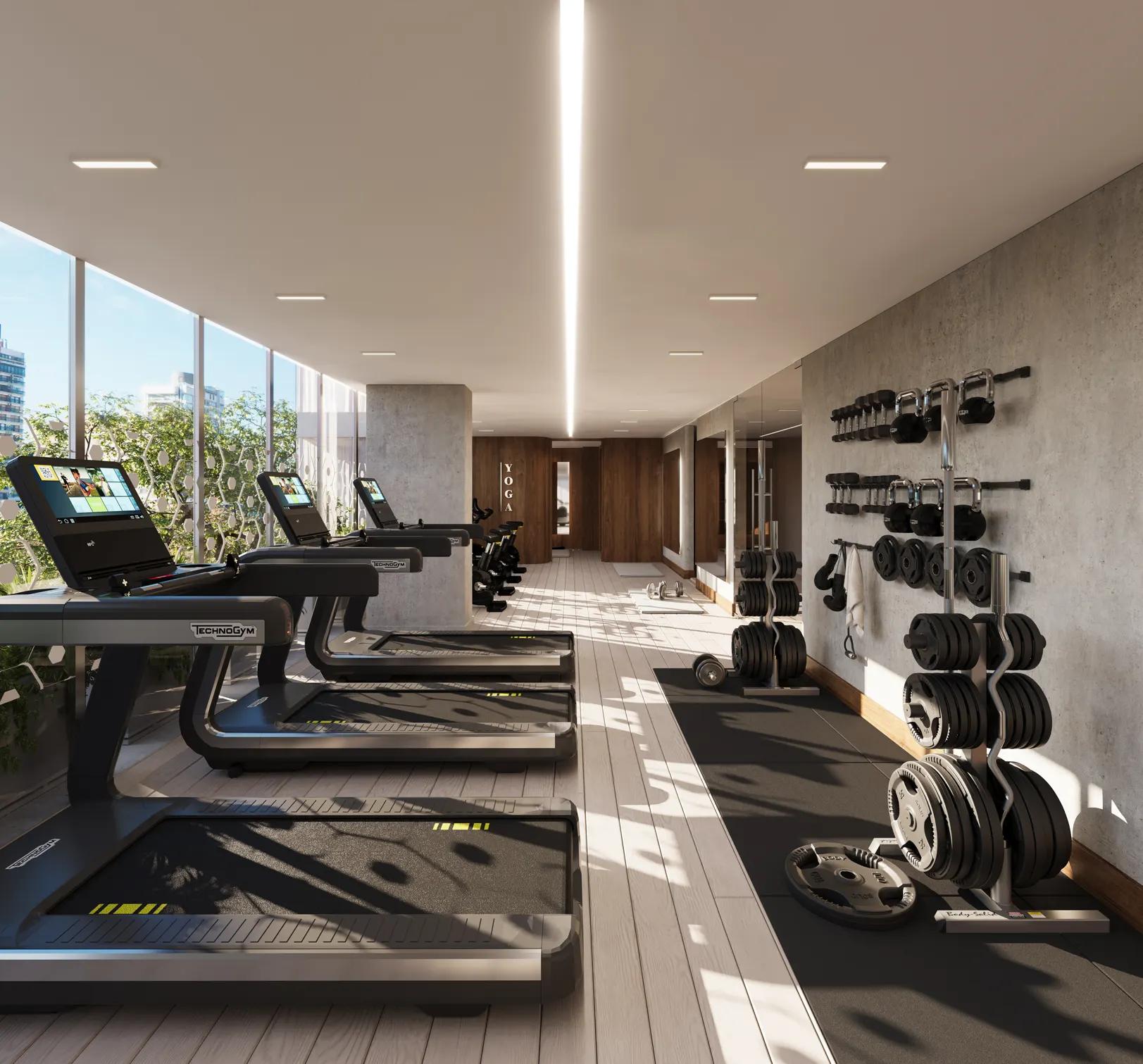 Gimnasio moderno equipado con cintas de correr, máquinas de ejercicio y zona de pesas
