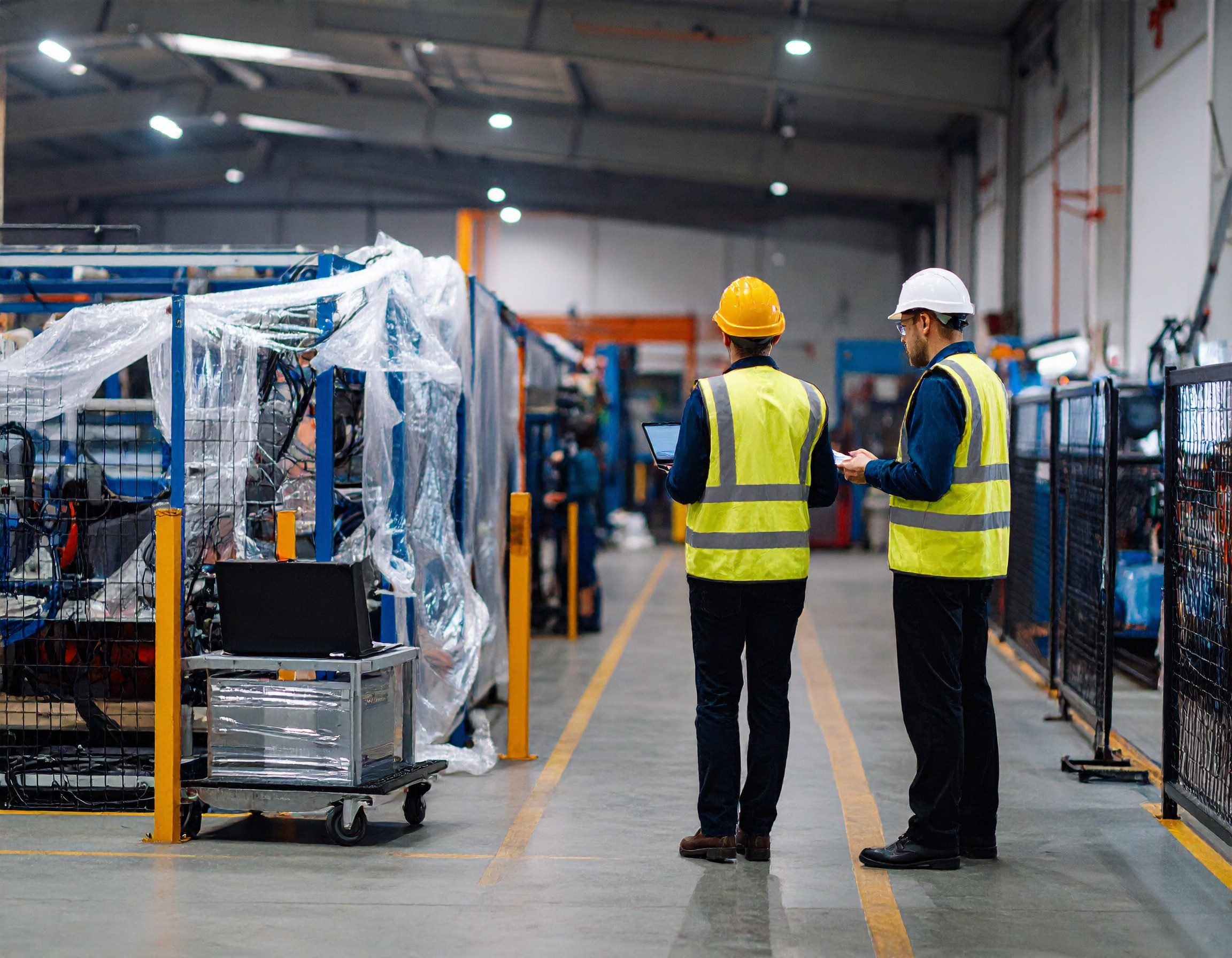 operators discuss with temporary machinery