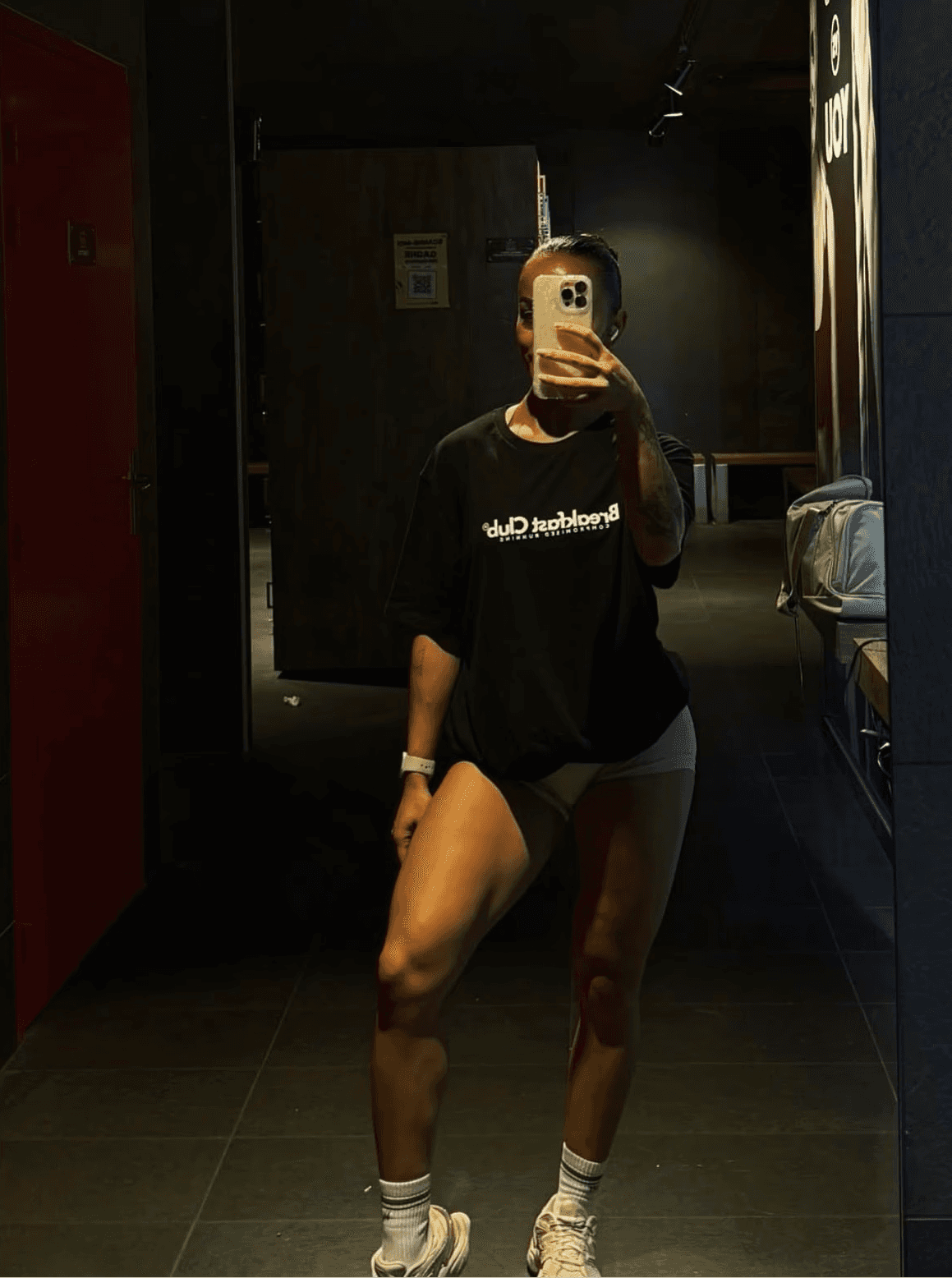 close-up image of a guys shirt wearing a lanyard