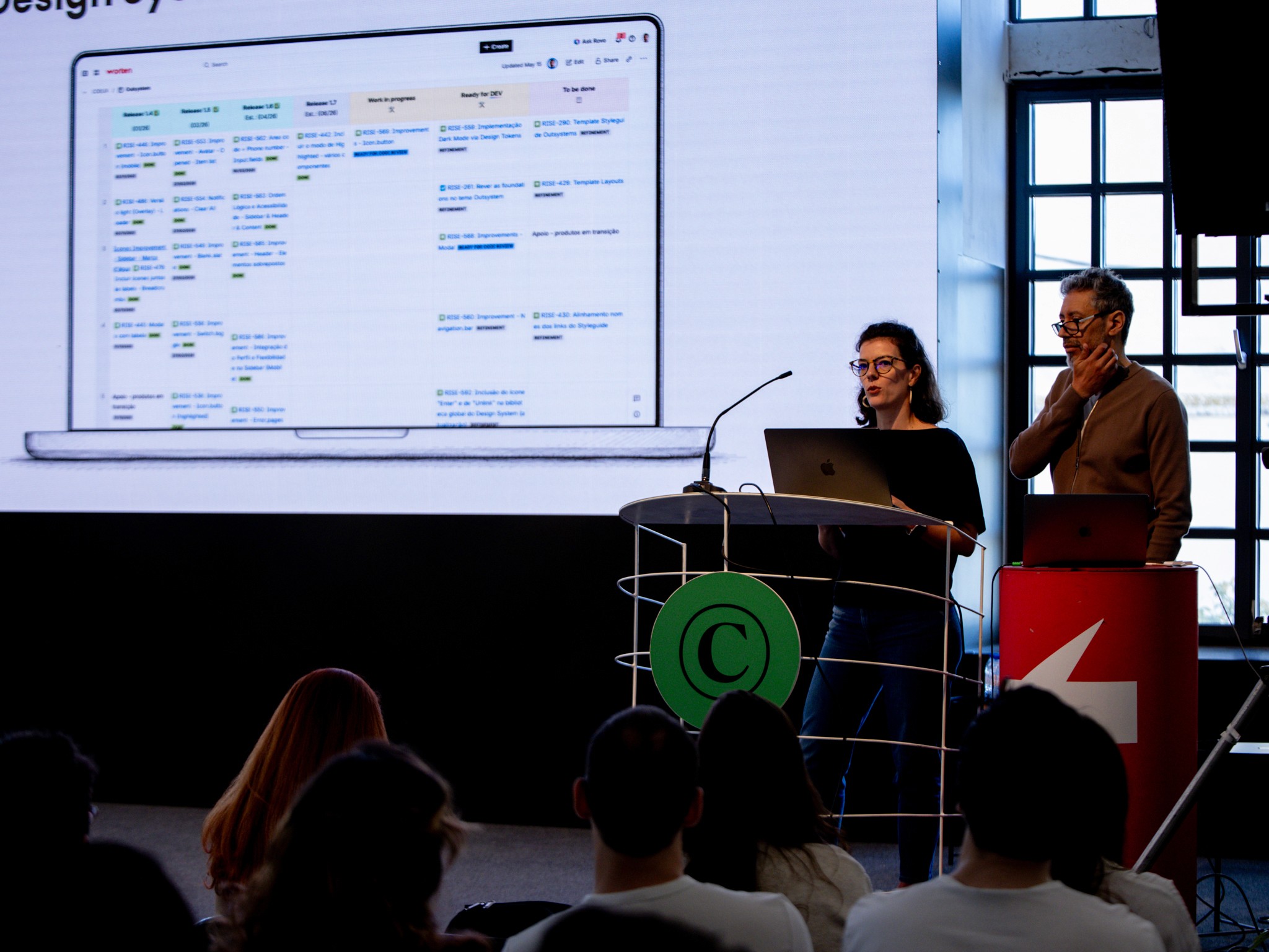 Juliana Freitas presenting at the 28th Festival CCP stage