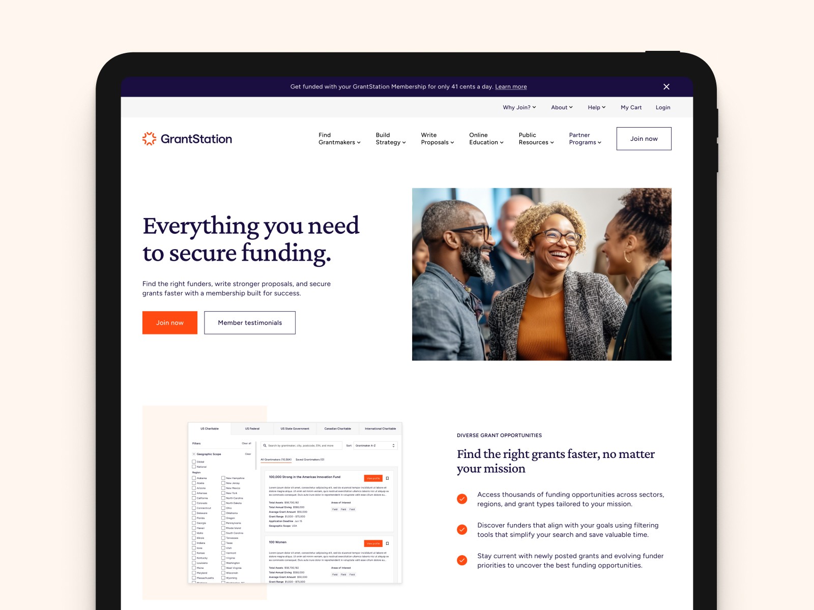 GrantStation website homepage displayed on a tablet screen, highlighting headline text and diverse team imagery.