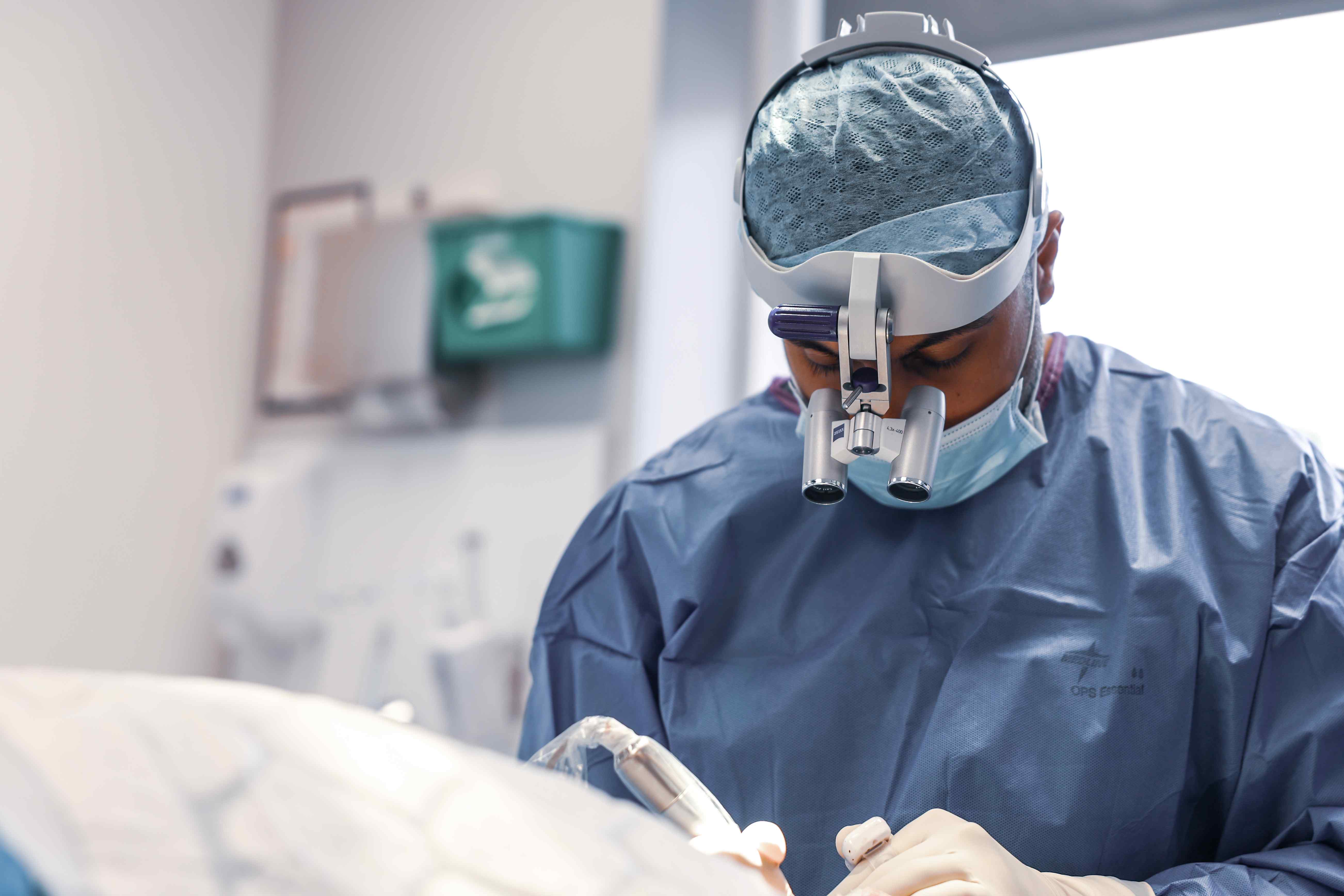 Dr Raja Performing an FUE Procedure