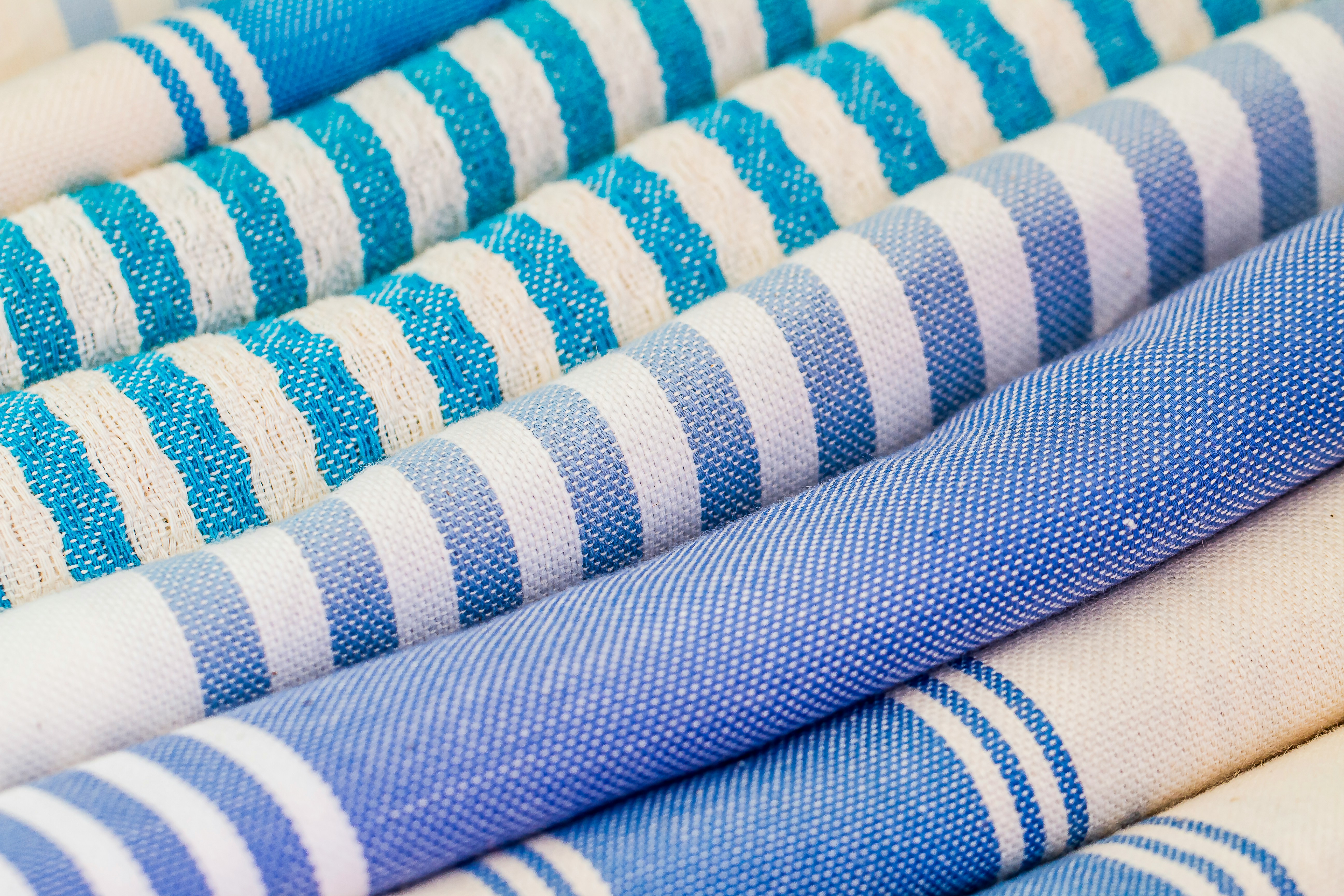 a man in a yellow shirt is working on a roof