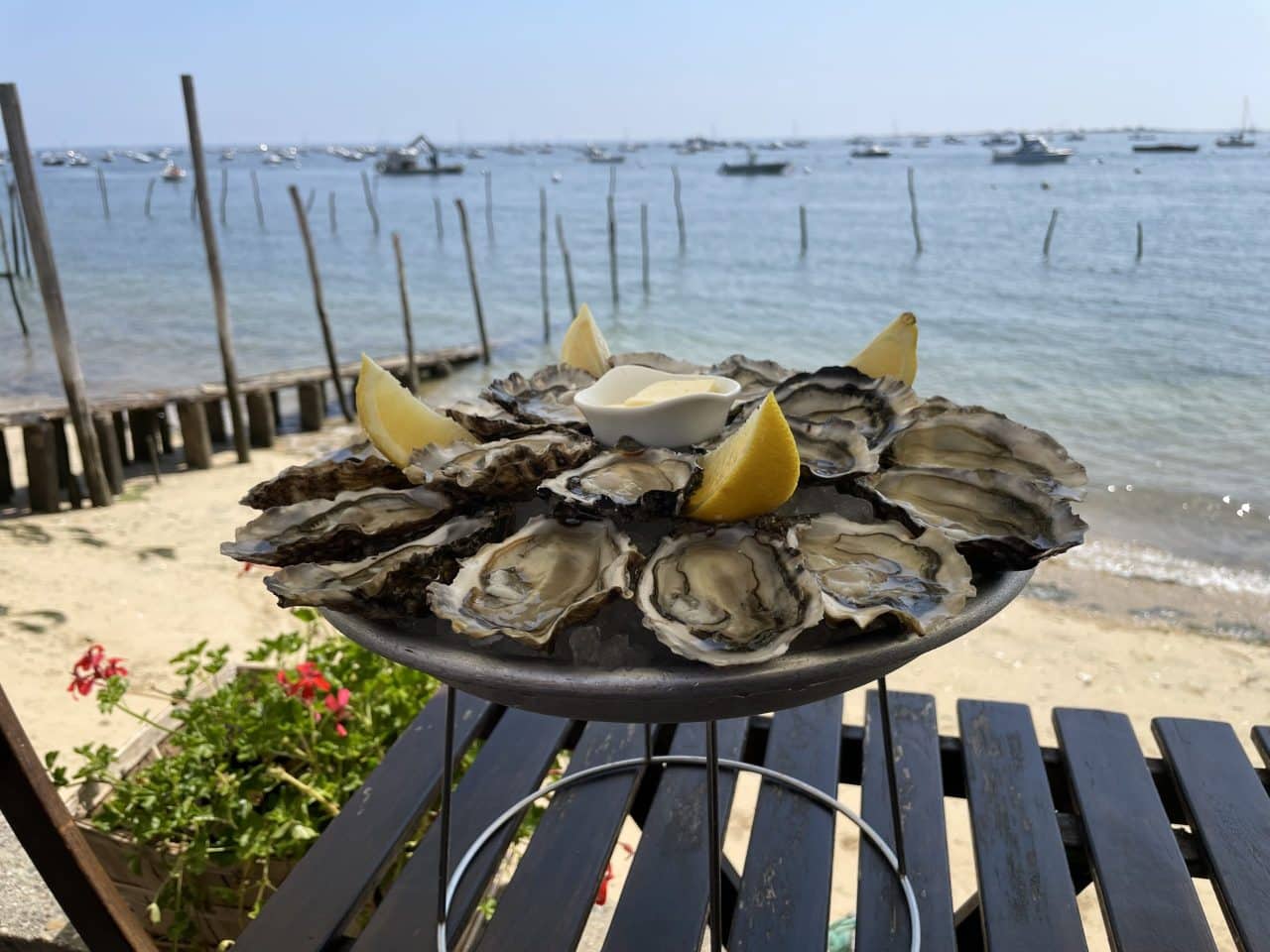 A man stading with Surfboard