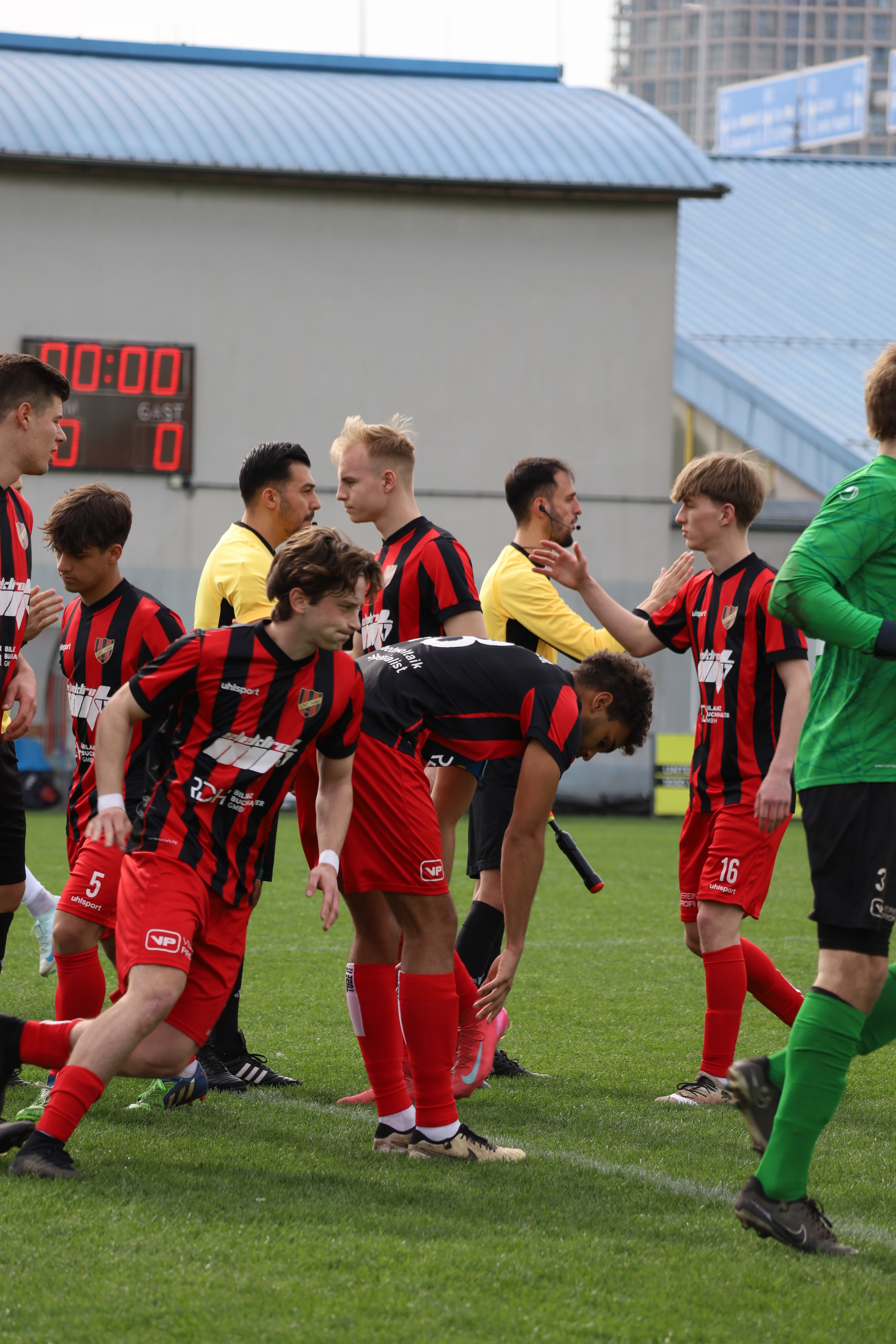 Players shake hands with referee