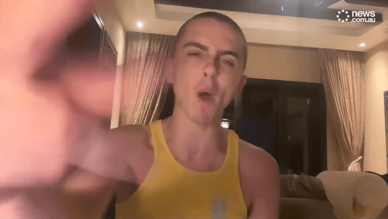 Screenshot from the viral Marty Supreme ‘leaked Zoom call’ ad showing a young man in a yellow tank top gesturing toward the webcam—an example of low-budget creative outperforming high-budget production.