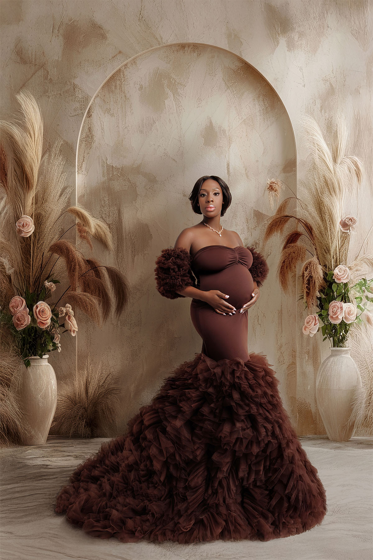 Bloom N’ Baby Studio maternity portrait with fluffy couture dress and neutral tones.