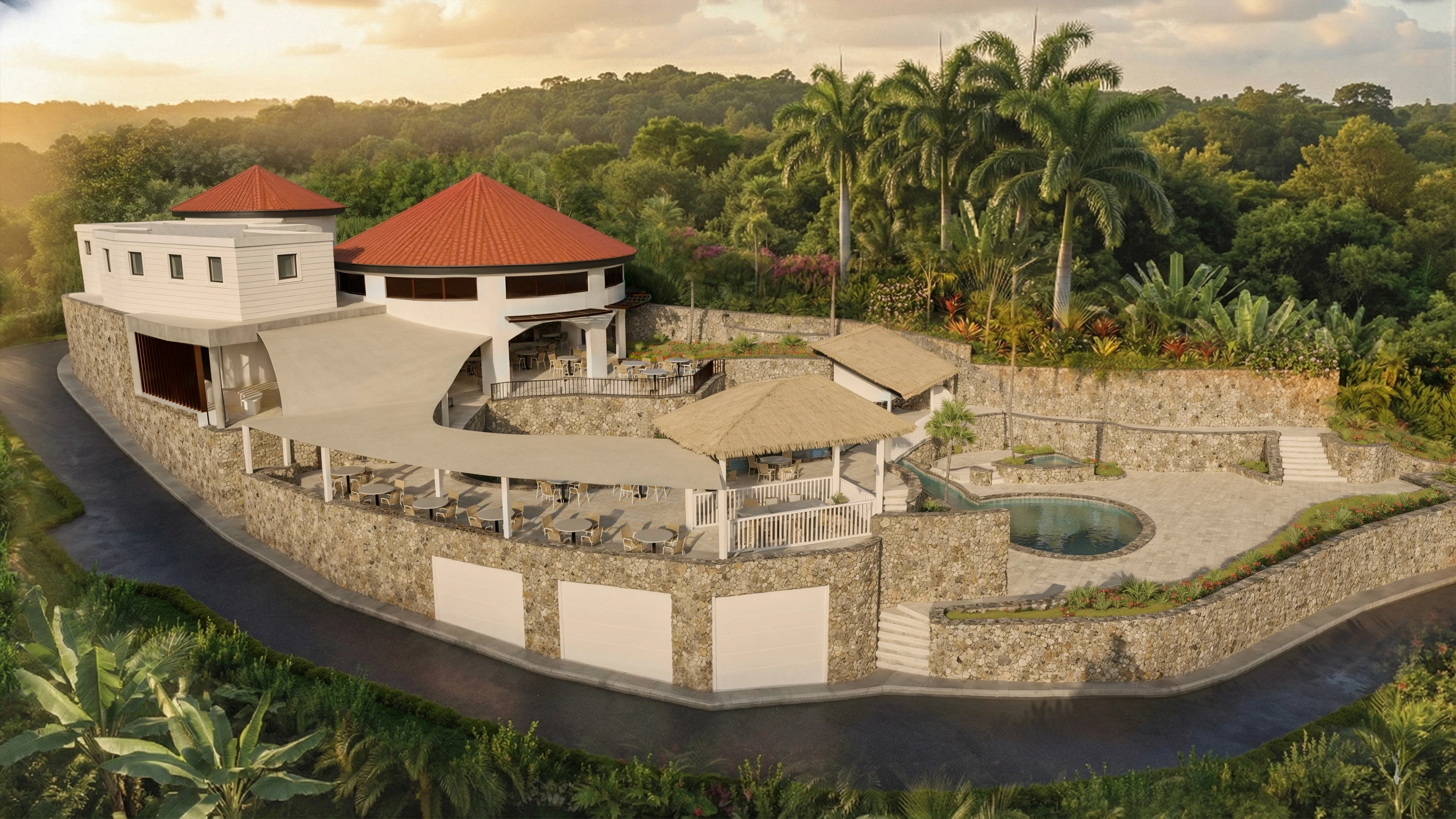 Aerial view of Papa Don's Restaurant at Windjammer Landing, Saint Lucia with circular clay-tile dining pavilions, terraced outdoor seating, and a hillside pool